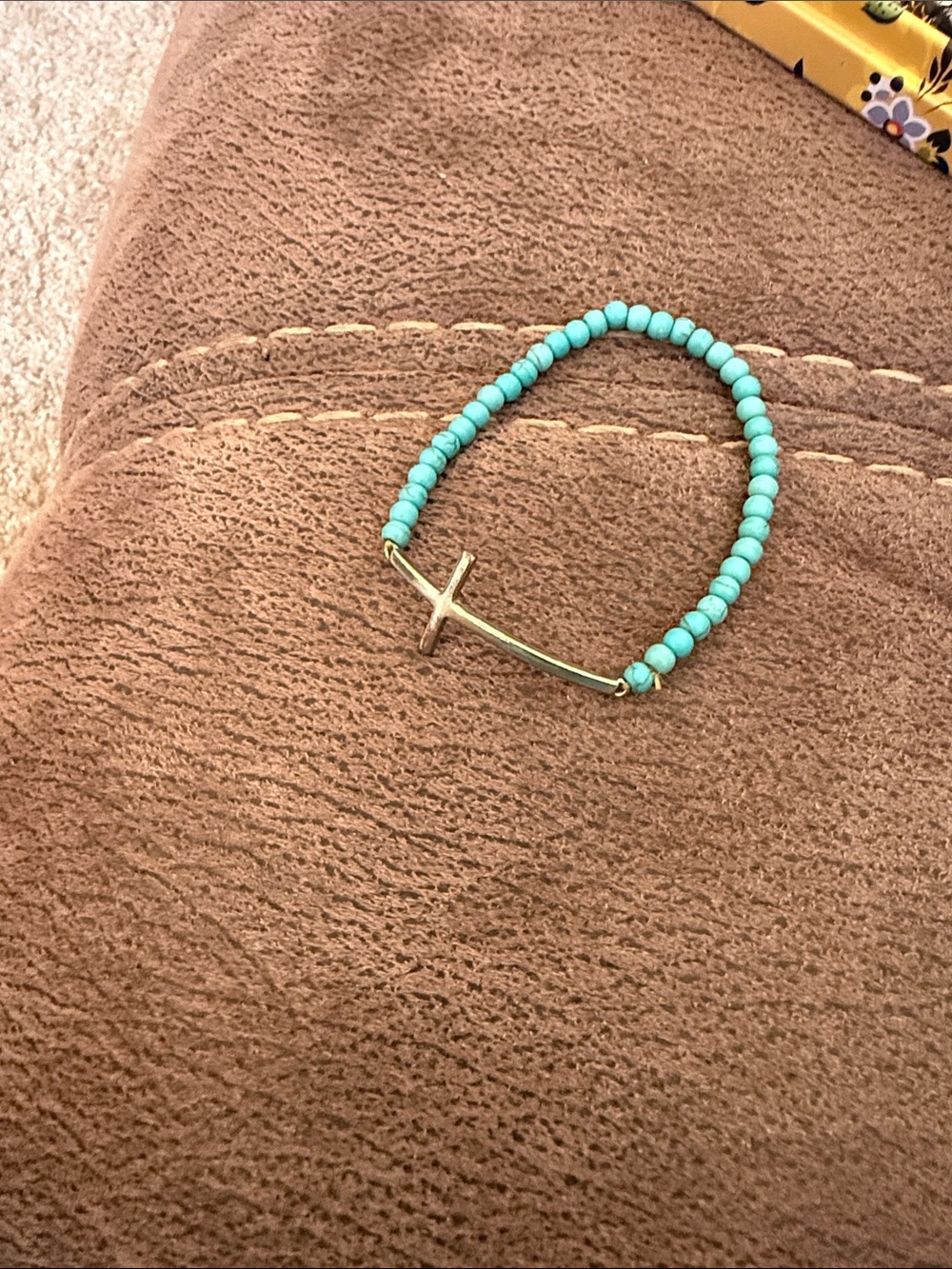 turquoise beaded stretch bracelet  with a delicate sideways metal cross